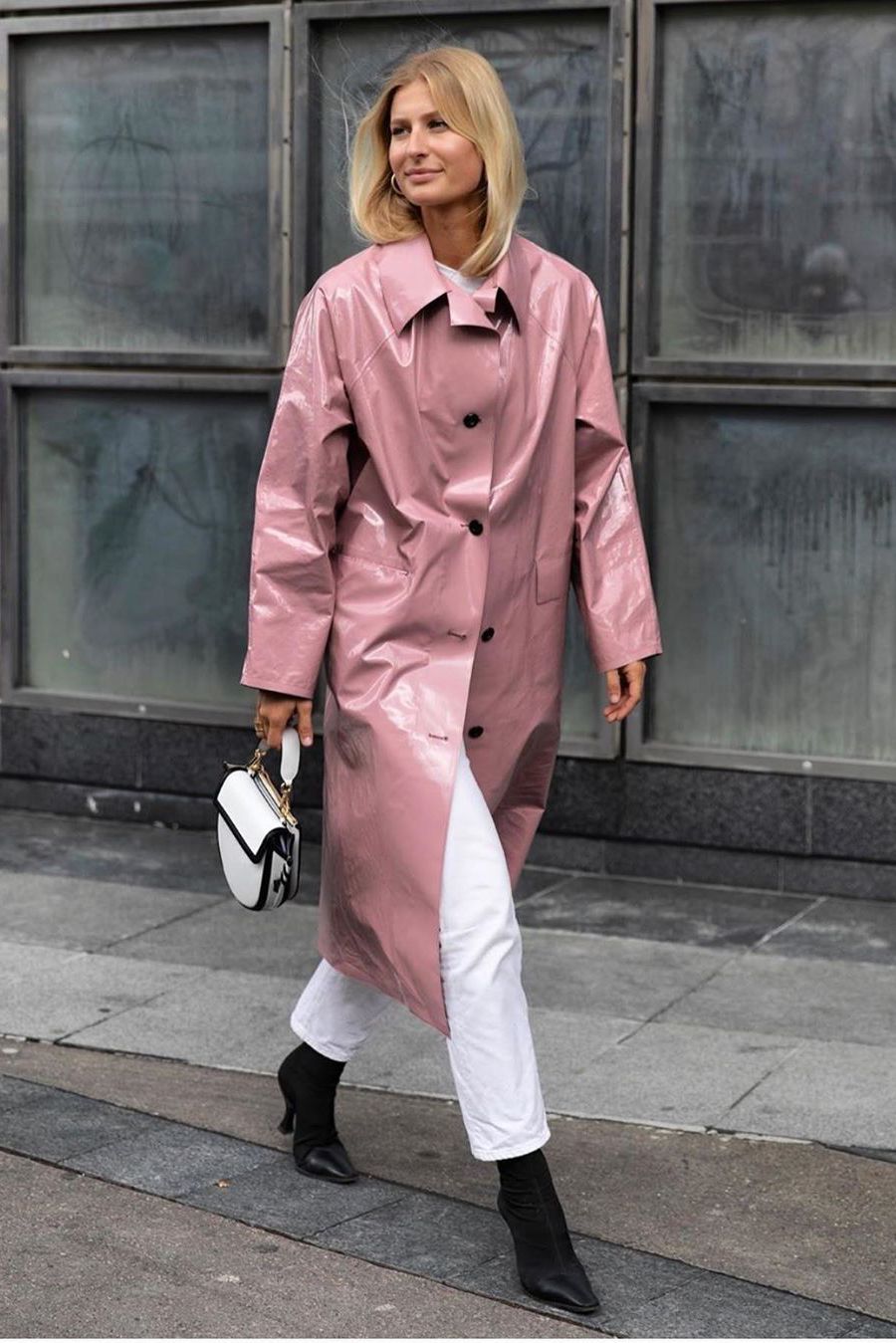 Pink trench coat with white jeans and black boots